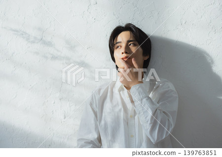man in white shirt man in white shirt 139763851