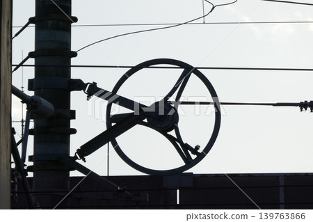 Rusty traffic light: Geometric patterns on top of the transmission tower 139763866