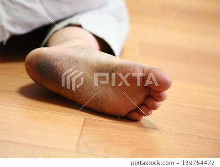 Dirty soles of children Dirty soles of children 139764472