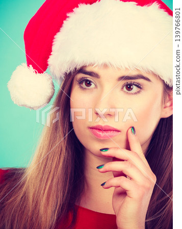 Happy woman wearing Santa Claus helper costume Happy woman wearing Santa Claus helper costume 139766801