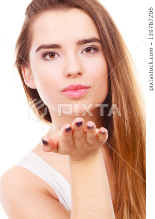 Teenager woman sending air kisses, love gesture Teenager woman sending air kisses, love gesture 139767206