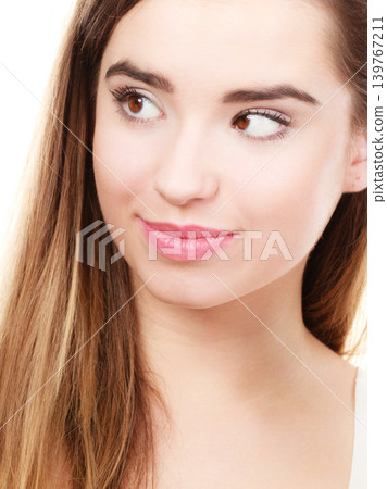 Closeup portrait of young teenager woman. Closeup portrait of young teenager woman. 139767211