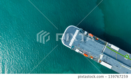 Aerial top view vehicles carrier on sea, Ro Ro (Roll on Roll off) automobile carrier vessel international car terminal, Automobile industry distribution logistic transport new car. 139767259