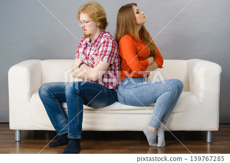 Woman and man after argue on sofa 139767285