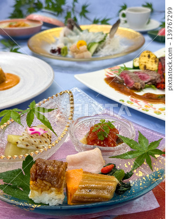A Japanese course meal featuring beautifully presented seasonal appetizers. 139767299