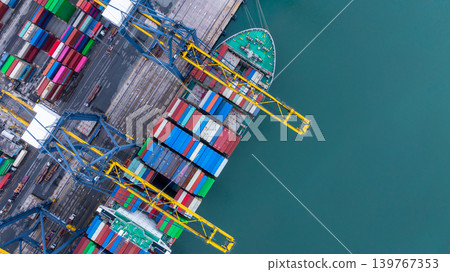 Container ship carrying container box in import export with quay crane, Global business cargo freight shipping commercial trade logistic and transportation oversea worldwide by container vessel. 139767353