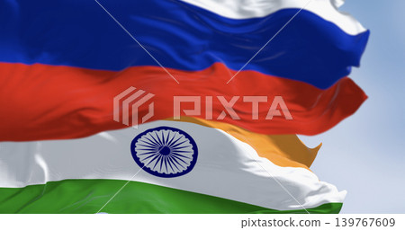 The flags of India and Russia waving in the wind on a clear day 139767609