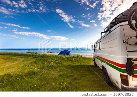 Camper van and tent on beach, Lofoten Norway Camper van and tent on beach, Lofoten Norway 139768025