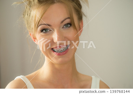 Happy positive smiling blonde woman Happy positive smiling blonde woman 139768144