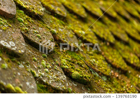 Aged Traditional Clay Roof Tiles Texture Background with Cracked Antique Stone Surface, Vintage Weathered Roof Aged Traditional Clay Roof Tiles Texture Background with Cracked Antique Stone Surface, Vintage Weathered Roof 139768190