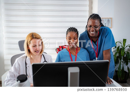 Diverse medical team collaborating on digital healthcare solutions Diverse medical team collaborating on digital healthcare solutions 139768930