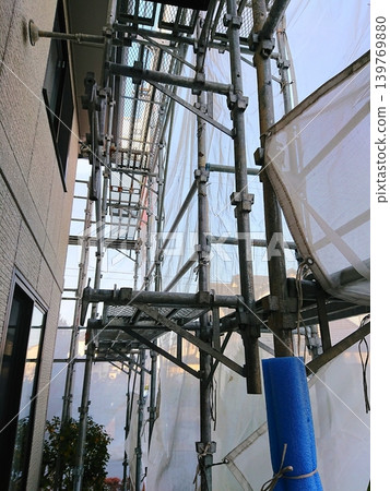Scaffolding for building painting Scaffolding for building painting 139769880