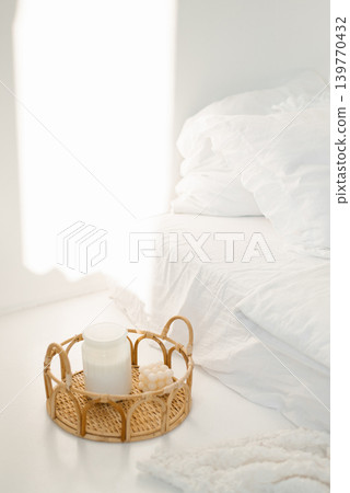 Cozy Bedroom Interior with Rattan Tray Candle Cozy Bedroom Interior with Rattan Tray Candle 139770432