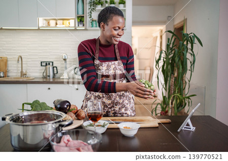 Woman holding brussels sprouts preparing healthy meal Woman holding brussels sprouts preparing healthy meal 139770521