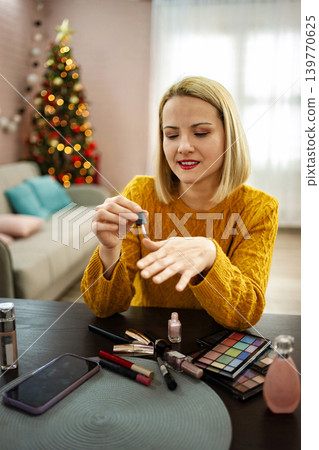 Relaxed afternoon of beauty and creativity in a cozy living room adorned for the festive season Relaxed afternoon of beauty and creativity in a cozy living room adorned for the festive season 139770625