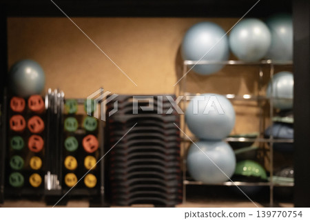 Fitness studio equipment shelves in modern dark gym interior 139770754