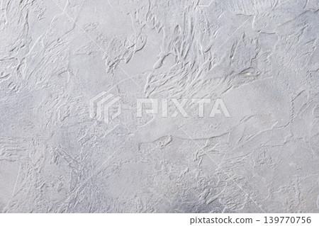 White textured plaster wall background with minimal abstract pattern White textured plaster wall background with minimal abstract pattern 139770756