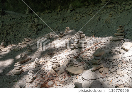 Stone piles imbued with wishes and silence Stone piles imbued with wishes and silence 139770996
