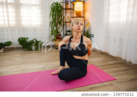 Yoga practice for flexibility and relaxation at home Yoga practice for flexibility and relaxation at home 139771012