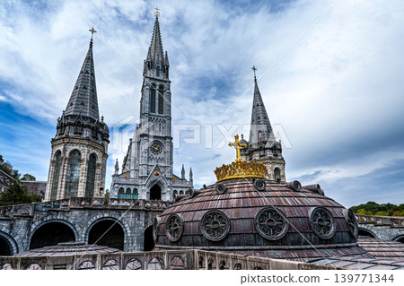 View of the Basilica in the Sanctuary of Lourdes, France. Mayor pilgrimage spot for Catholics 139771344