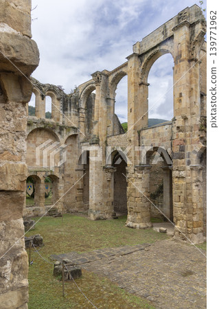 Ruins of Alet les Bains Abbey in France showing arches and columns Ruins of Alet les Bains Abbey in France showing arches and columns 139771962