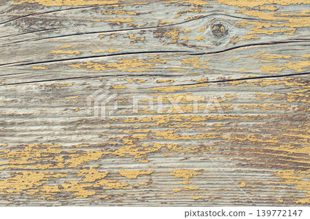 Rustic wood texture or background with yellow paint.  Close up. 139772147