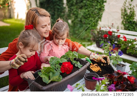 Gardening together brings joy and love to family moments Gardening together brings joy and love to family moments 139772305