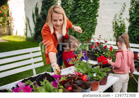 Joyful moments spent in a vibrant garden area Joyful moments spent in a vibrant garden area 139772308