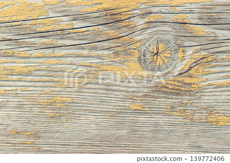 Rustic wood texture or background with yellow paint. Rustic wood texture or background with yellow paint. 139772406