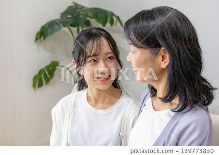 A close mother and daughter having a conversation A close mother and daughter having a conversation 139773830