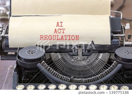 AI act regulation words symbol. Concept words AI artificial intelligence act regulation typed on beautiful old typewriter. Beautiful white background. Business AI act regulation concept. Copy space. AI act regulation words symbol. Concept words AI artificial intelligence act regulation typed on beautiful old typewriter. Beautiful white background. Business AI act regulation concept. Copy space. 139775186