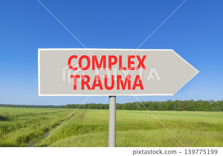 Complex trauma words symbol. Concept words Complex trauma on beautiful grey road sign. Beautiful blue sky green field background. Psychological complex trauma support concept. Copy space. Complex trauma words symbol. Concept words Complex trauma on beautiful grey road sign. Beautiful blue sky green field background. Psychological complex trauma support concept. Copy space. 139775199
