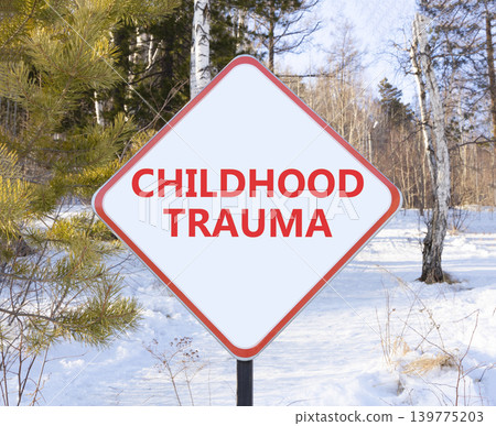 Childhood trauma words symbol. Concept words Childhood trauma on beautiful white road sign. Beautiful winter forest background. Psychological childhood trauma support concept. Copy space. Childhood trauma words symbol. Concept words Childhood trauma on beautiful white road sign. Beautiful winter forest background. Psychological childhood trauma support concept. Copy space. 139775203