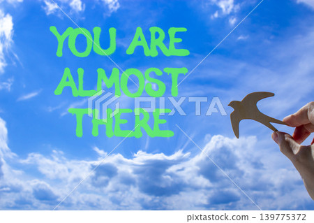 You are almost there words symbol. Concept words You are almost there on beautiful blue sky. Beautiful blue sky background. Business You are almost there motivational support concept. Copy space. You are almost there words symbol. Concept words You are almost there on beautiful blue sky. Beautiful blue sky background. Business You are almost there motivational support concept. Copy space. 139775372