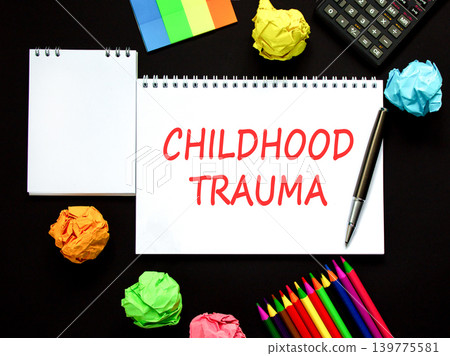 Childhood trauma words symbol. Concept words Childhood trauma on beautiful white note. Beautiful black background. Pen. Black calculator. Psychological childhood trauma support concept. Copy space Childhood trauma words symbol. Concept words Childhood trauma on beautiful white note. Beautiful black background. Pen. Black calculator. Psychological childhood trauma support concept. Copy space 139775581