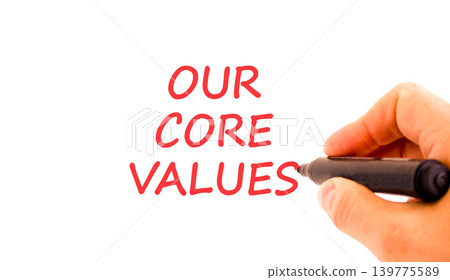 Our core values words symbol. Concept words Our core values on beautiful white paper. Beautiful white background. Businessman hand. Business our core values motivational support concept. Copy space. 139775589