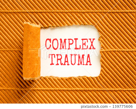 Complex trauma words symbol. Concept words Complex trauma on beautiful white paper. Beautiful brown background. Psychological complex trauma support concept. Copy space. Complex trauma words symbol. Concept words Complex trauma on beautiful white paper. Beautiful brown background. Psychological complex trauma support concept. Copy space. 139775606