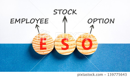 ESO employee stock option symbol. Concept words ESO employee stock option on beautiful wooden circles. Beautiful white blue background. Business ESO employee stock option concept. Copy space. ESO employee stock option symbol. Concept words ESO employee stock option on beautiful wooden circles. Beautiful white blue background. Business ESO employee stock option concept. Copy space. 139775643