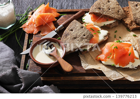 Finnish reikaleipa sandwich with salmon and cheese Finnish reikaleipa sandwich with salmon and cheese 139776213