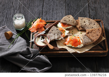 Finnish reikaleipa sandwich with salmon and cheese Finnish reikaleipa sandwich with salmon and cheese 139776216