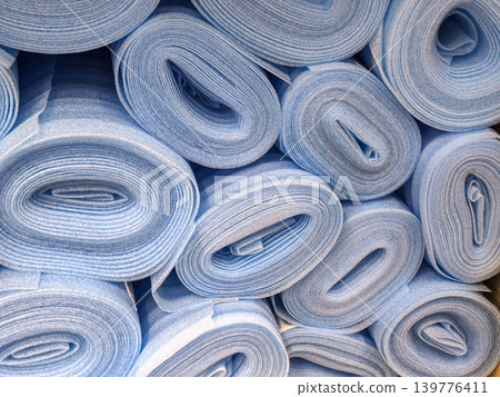 Many Rolls of Blue Foam Flooring Underlayment Many Rolls of Blue Foam Flooring Underlayment 139776411