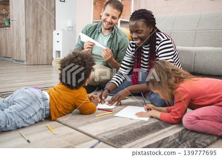 Multiracial family enjoys creative afternoon at home 139777695
