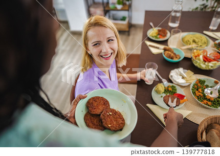 Delightful plant-based dinner in a cozy setting Delightful plant-based dinner in a cozy setting 139777818