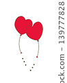 Two red heart-shaped balloons side by side 139777828