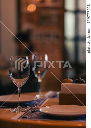 Wine glasses on the banque table in restaurant. 139777928