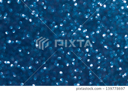 Abstract blue background. Shiny glitter bokeh in blue colors. Classic blue. Abstract blue background. Shiny glitter bokeh in blue colors. Classic blue. 139778697