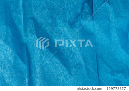 Blue matte wrinkled paper texture background Blue matte wrinkled paper texture background 139778857