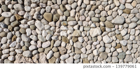 Pebble Stone Wall Texture Background 139779061
