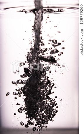 401.Water Stream Creating Rising Bubbles In Clear Liquid 139779260