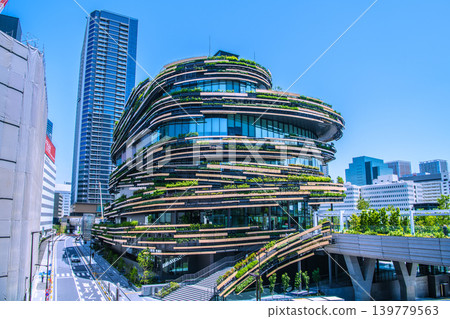 A view of Tokyo's cityscape, including MoN Takanawa in Takanawa Gateway City. 139779563